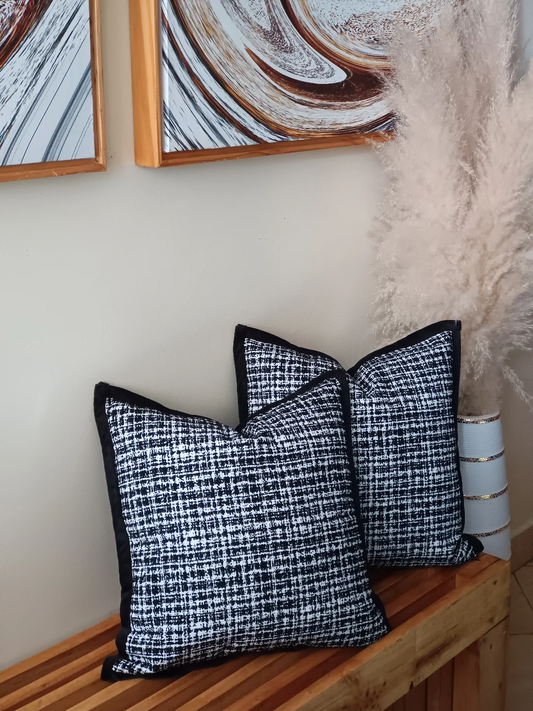 Monochrome grey sofa styling with textured black, white and grey cushions in Kenya