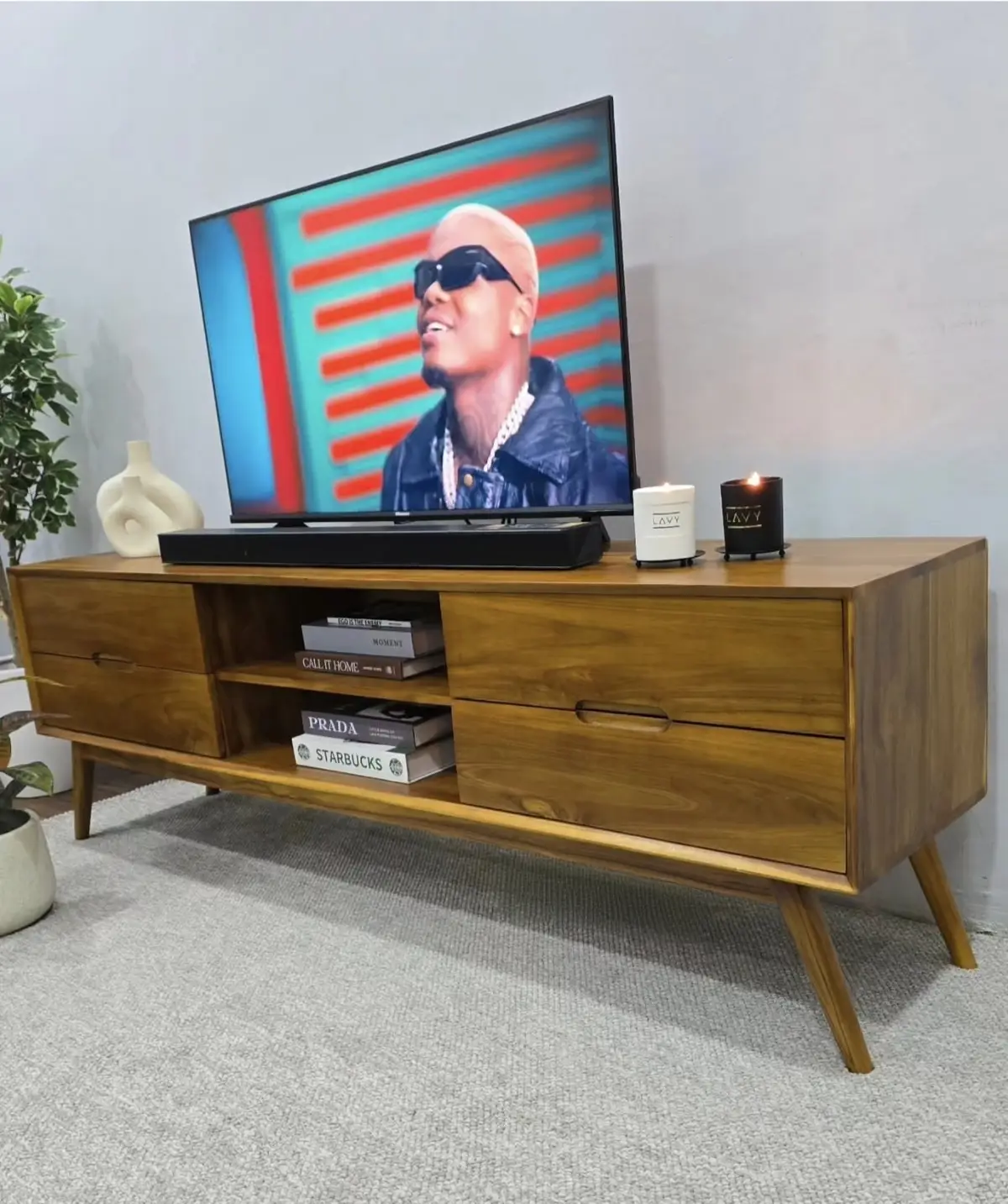 Solid wood TV stand with storage compared to MDF in a Kenyan living room
