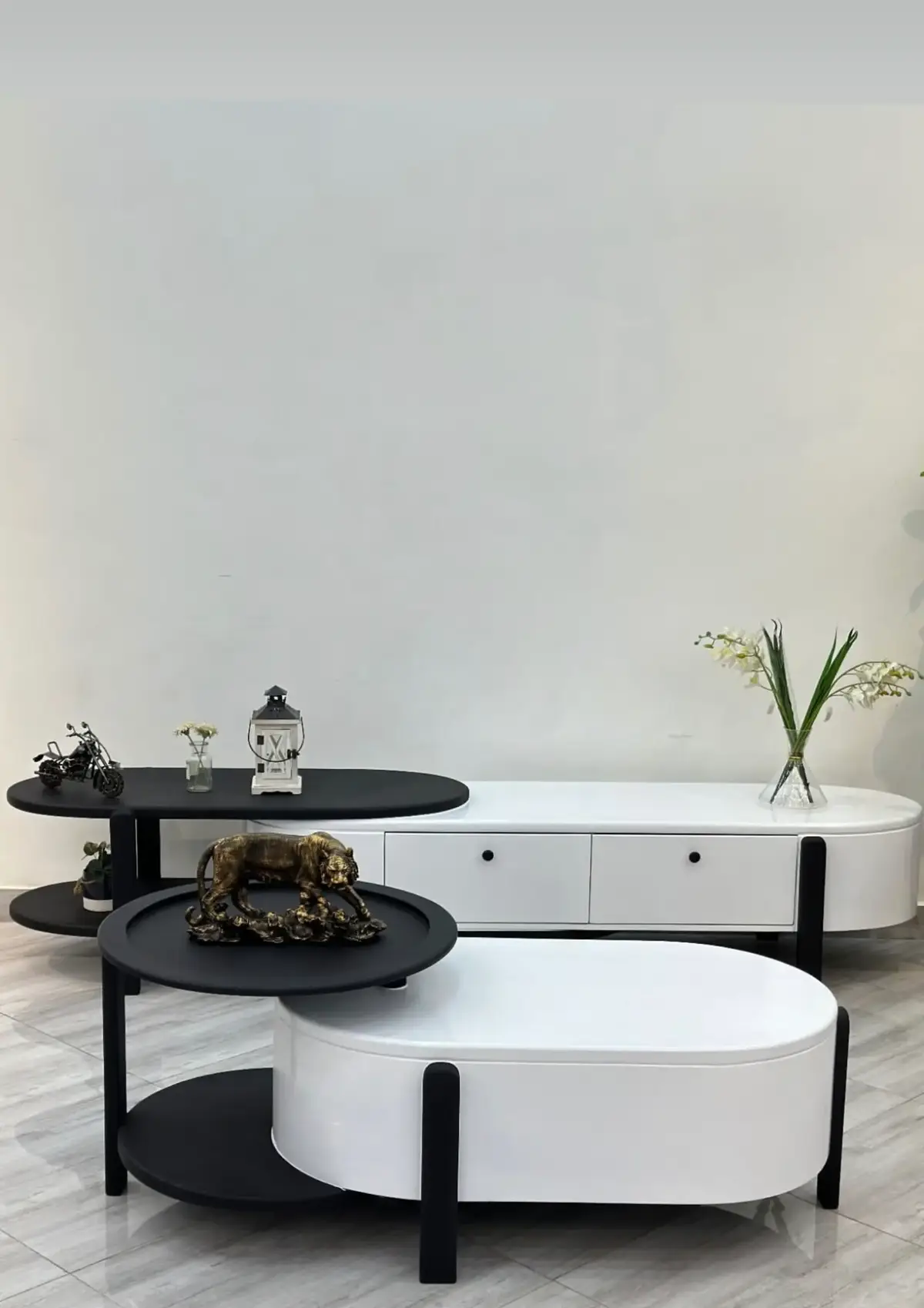 Warm wood-tone TV stand detail showing matt finish and slim legs