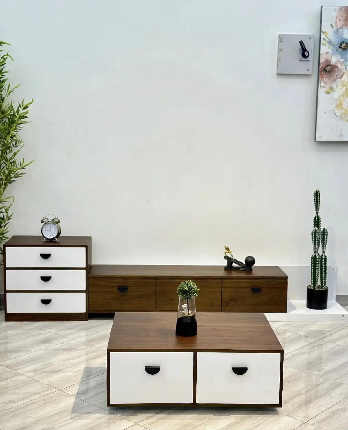Matching coffee table detail with the same wood tone and leg style