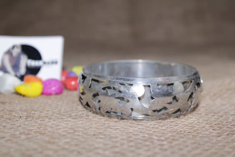 Floral Cut Out And Silver Plating Brass Bangle — Brass