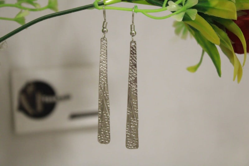 Silver Coated Earrings In Etched Design — undefined