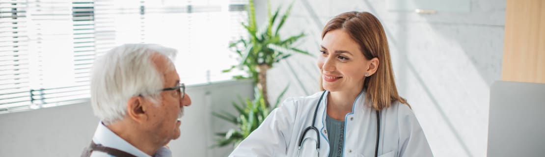 Doctor With Patient And Forms