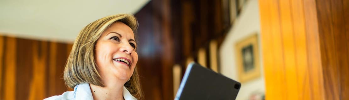 Happy Woman With Computer Tablet