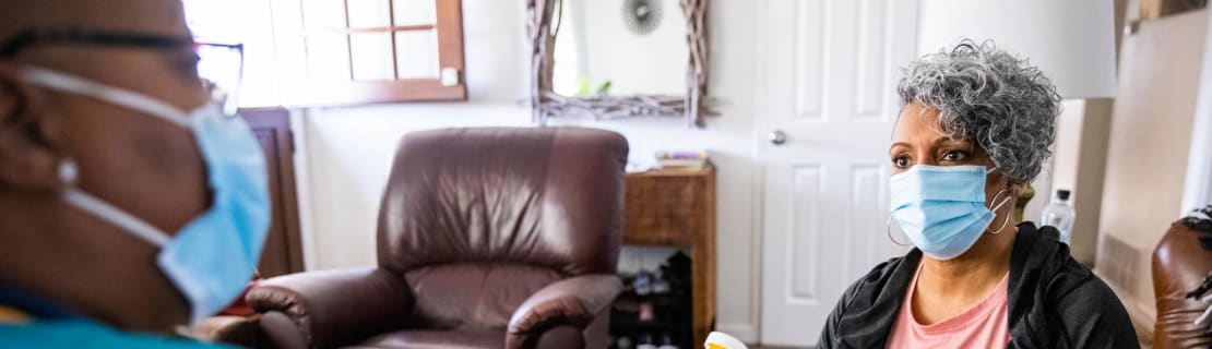 Senior Black Woman And Nurse Home Healthcare Visit