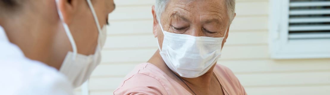 Senior Woman Getting Flu Shot Vaccine