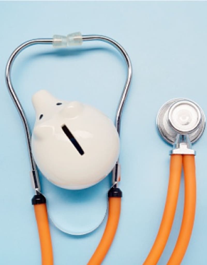 Piggy bank with a stethoscope, symbolizing savings on healthcare costs with a Medicare Supplement Plan.