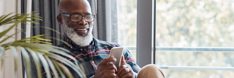 man checking his cell phone
