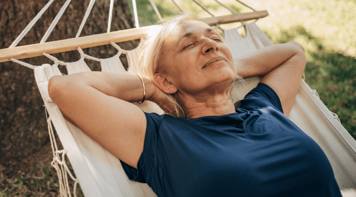 Woman resting in a hammock