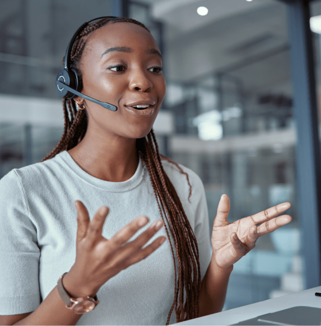 Smiling agent wearing a headset