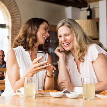 mother and daughter laughing