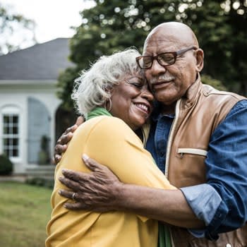 Happy Couple Embrace Outside