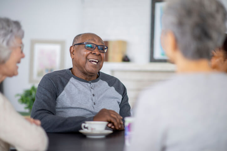 Man Having Tea With Friends