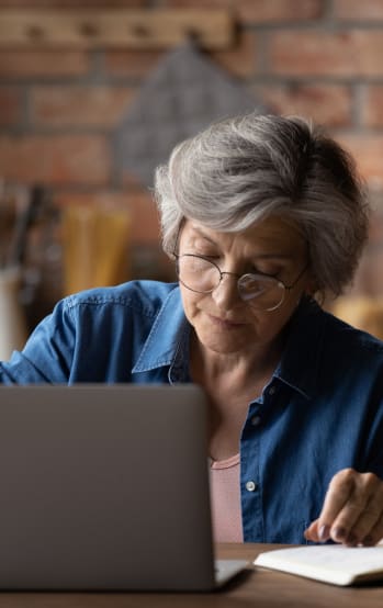 Woman learning on laptop