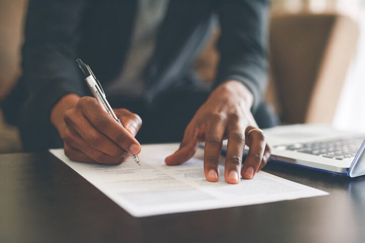 Man Filling Out A Form