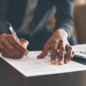 Man Filling Out A Form