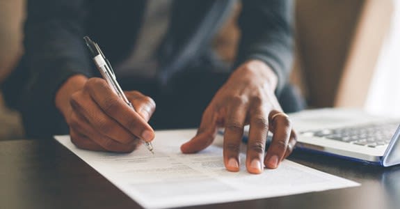 Man Filling Out A Form