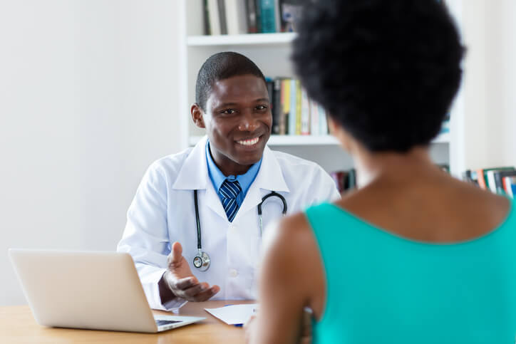 Woman meets with her doctor