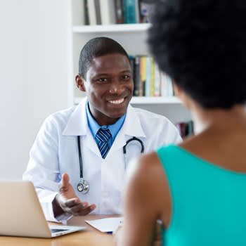 Woman meets with her doctor