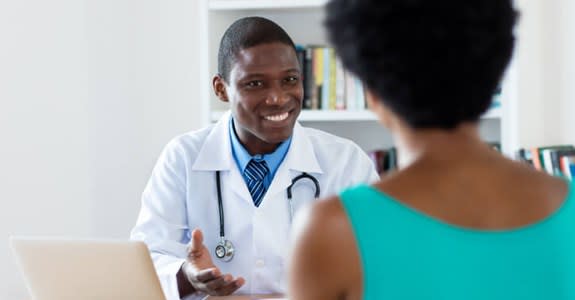 Woman meets with her doctor