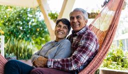 Happy Couple In A Hammock