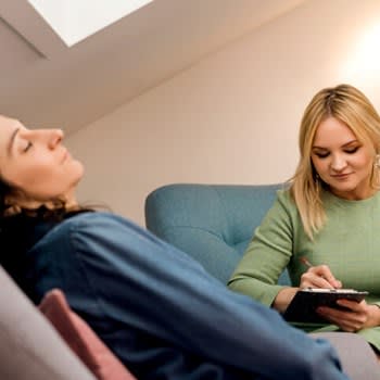 Therapist working with her patient