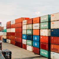 Shipping containers stacked at a port