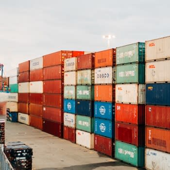 Shipping containers stacked at a port