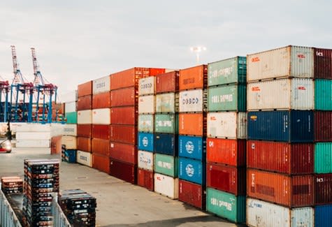 Shipping containers stacked at a port