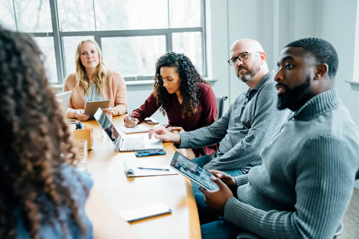 Group At A Meeting Table