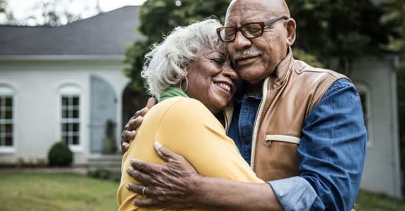 Happy Couple Embrace Outside