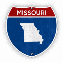 Road sign with Missouri text and state outline.