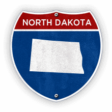 Road sign with North Dakota text and state outline.