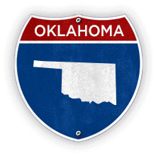 Road sign with Oklahoma text and state outline.