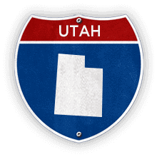 Road sign with Utah text and state outline.