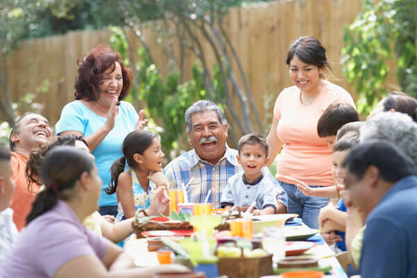 Multiple generations of a family at a picnic