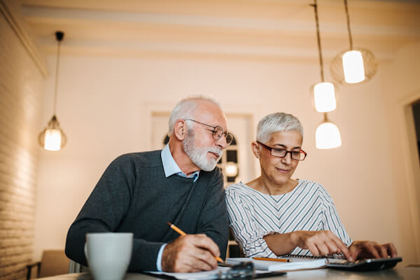 Couple calculating costs