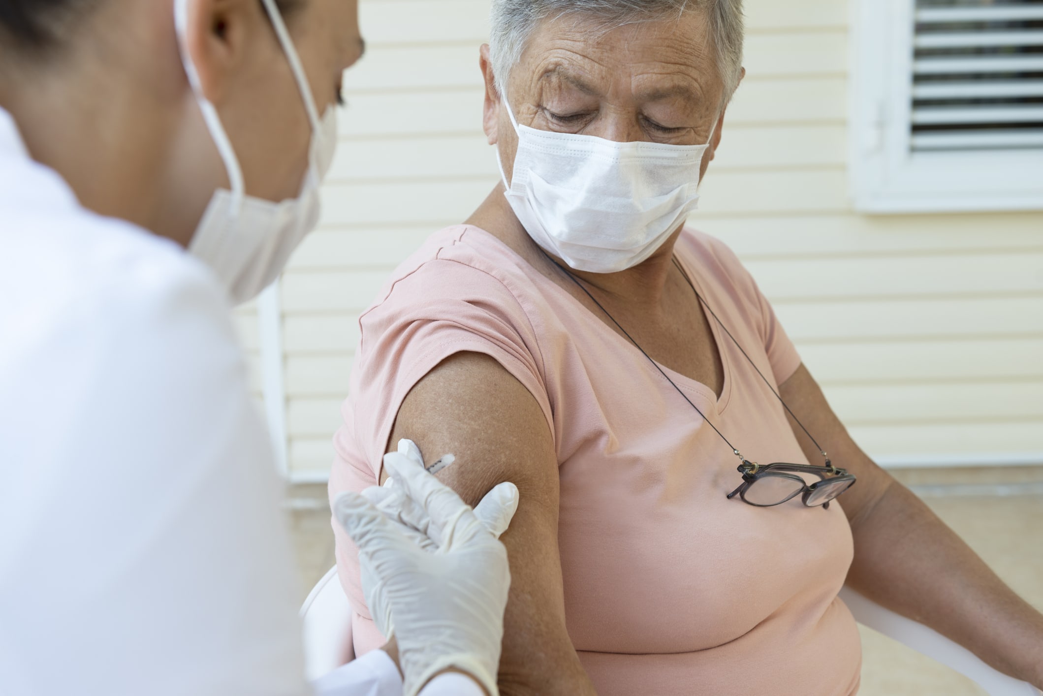 Senior Woman Getting Flu Shot Vaccine
