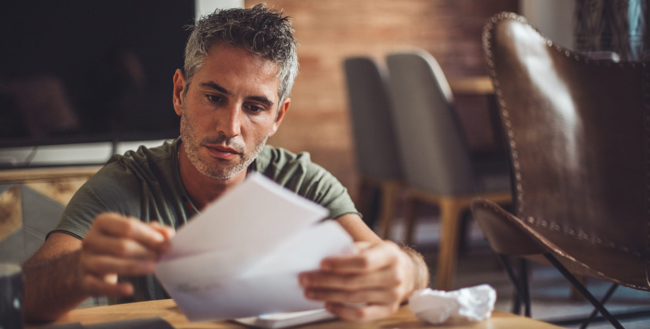 Latino Man Stressed Paying Bills