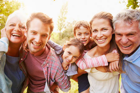 Three generations of family smile