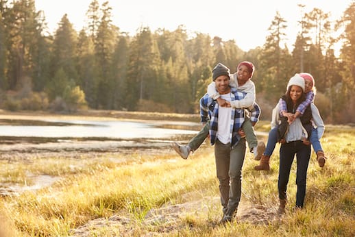 Young family takes a mountain hike