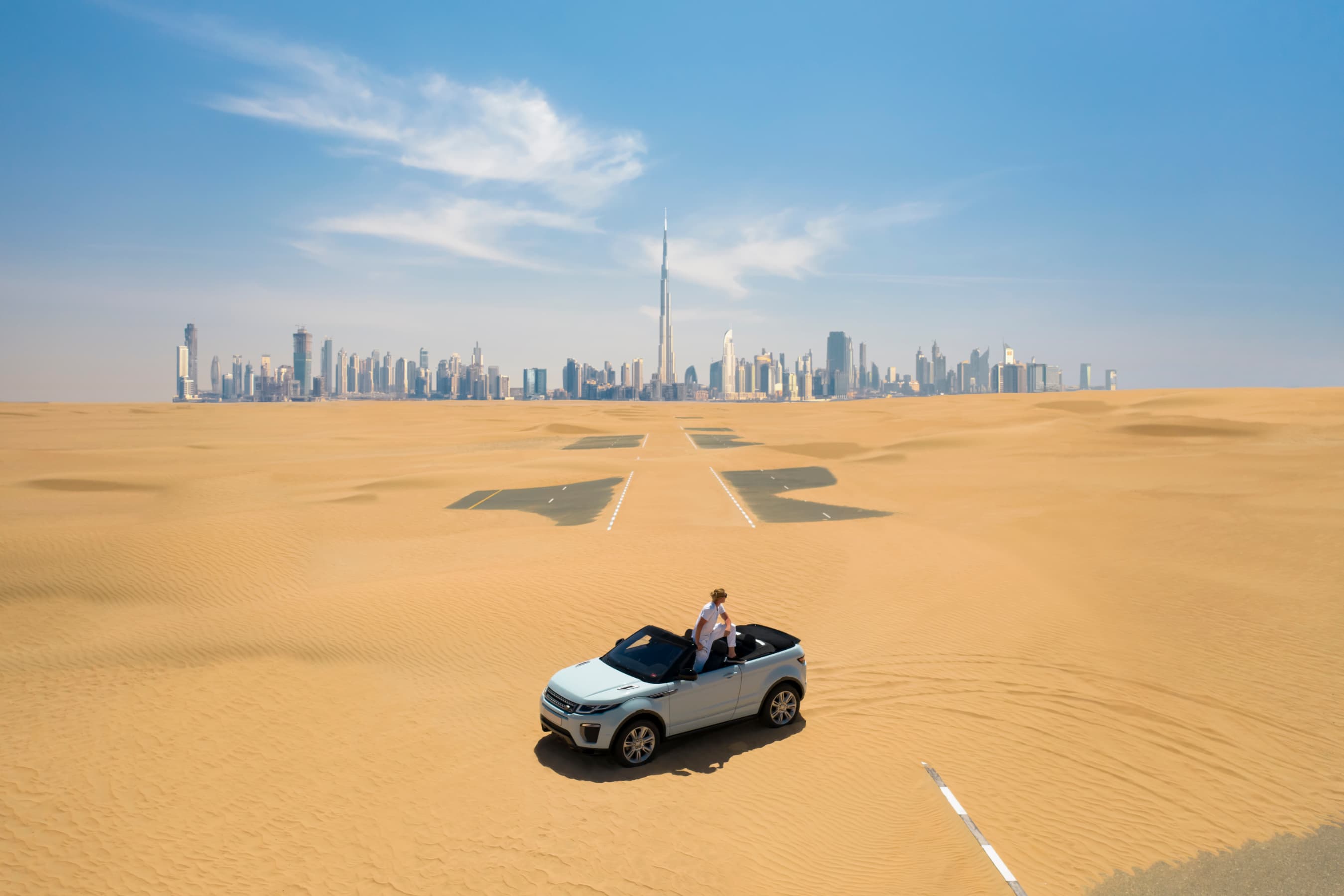 What to do in Dubai - Tourist enjoying Dubai's desert safari
