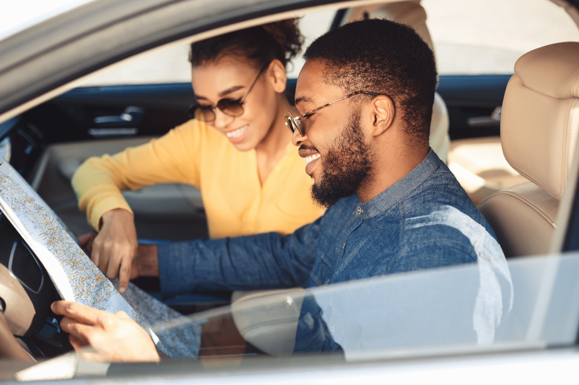 Couples planning their next vacation - A GUIDE TO PLANNING A STRESS-FREE VACATION - travelbeta blog