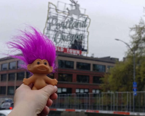 Oswald at White Stag Sign in Portland, OR, USA