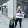 Thumbnail: A friendly woman holding an "ability adventures" sign