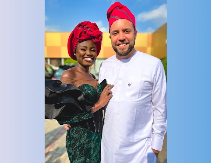Chris and his wife Adenike at a Nigerian wedding
