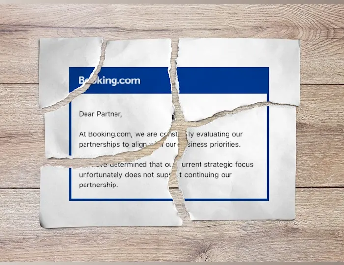 A screenshot of a booking.com email torn up