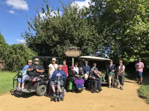 People in wheelchairs and accessible vehicles