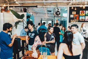 Travel industry and tech people socialising at a networking event at Toronto Tech Week at Nickel 9 Distillery on June 24.