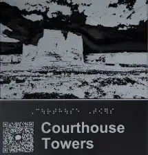 A tactile photo of the Courthouse Towers in Utah, featuring a QR code  code that scannable tactile QR code that provides a detailed audio description of the image.